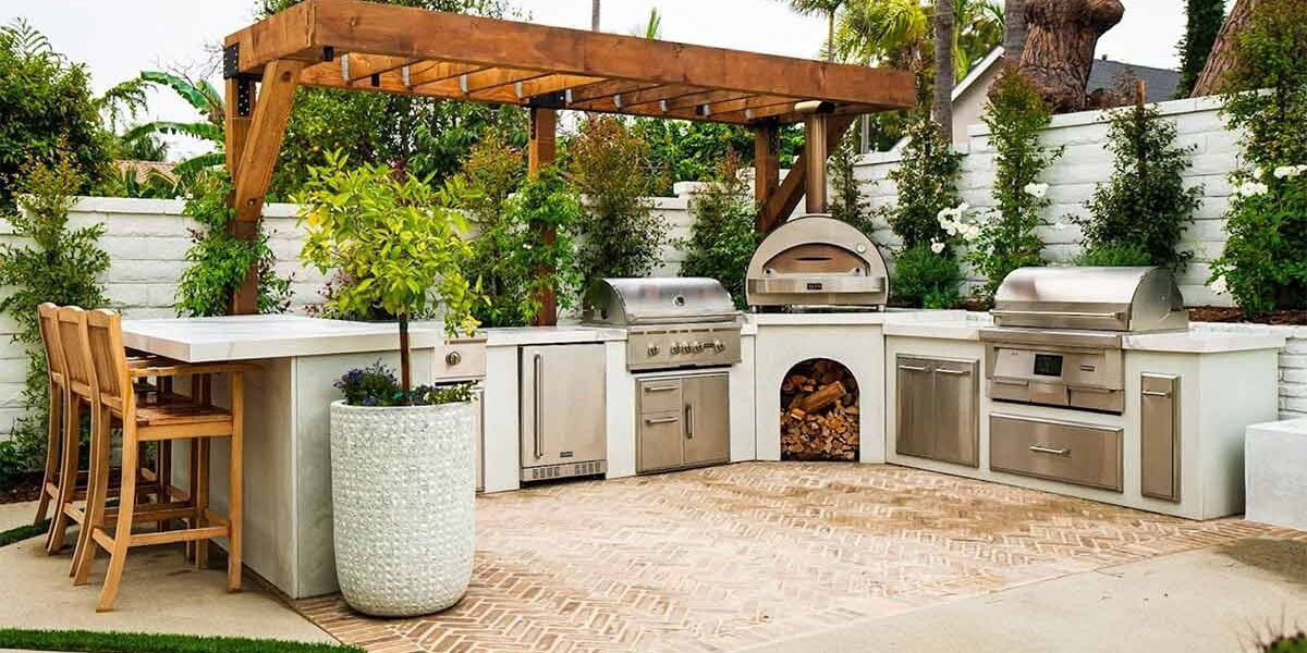 Custom outdoor kitchen with built-in grill on a Littleton, CO patio